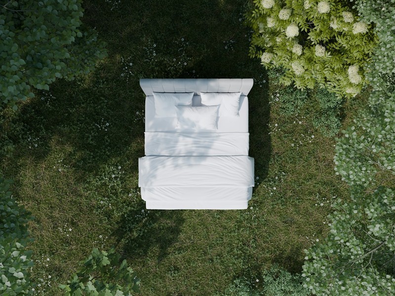 Bed van Ecolife Beds in grasveld.