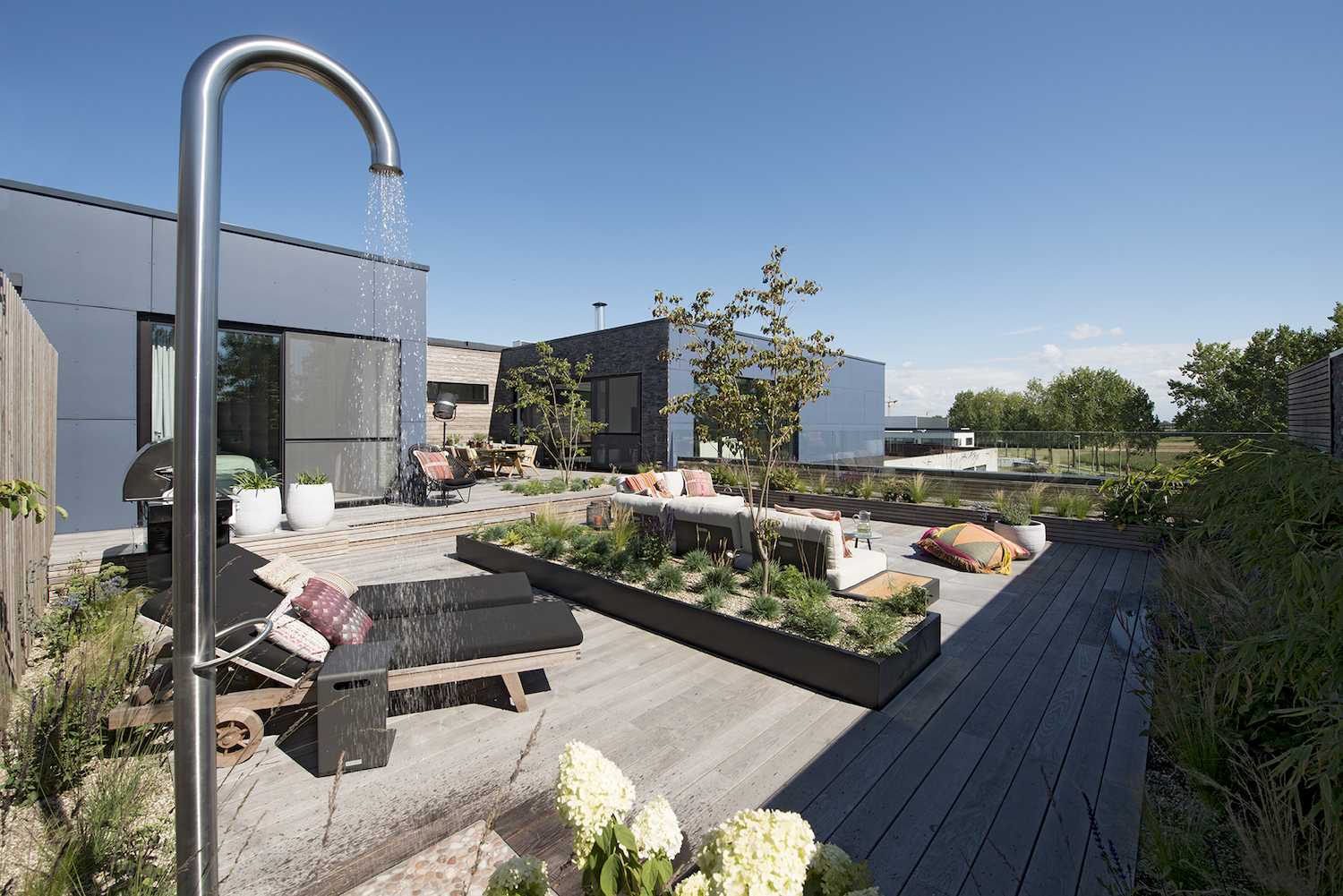 Een buitendouche van Jee-O