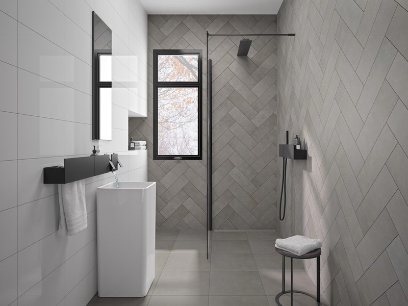 Badkamersfeer Noble, de combinatie van stoere materialen en grijstinten zorgt voor een industriële uitstraling.