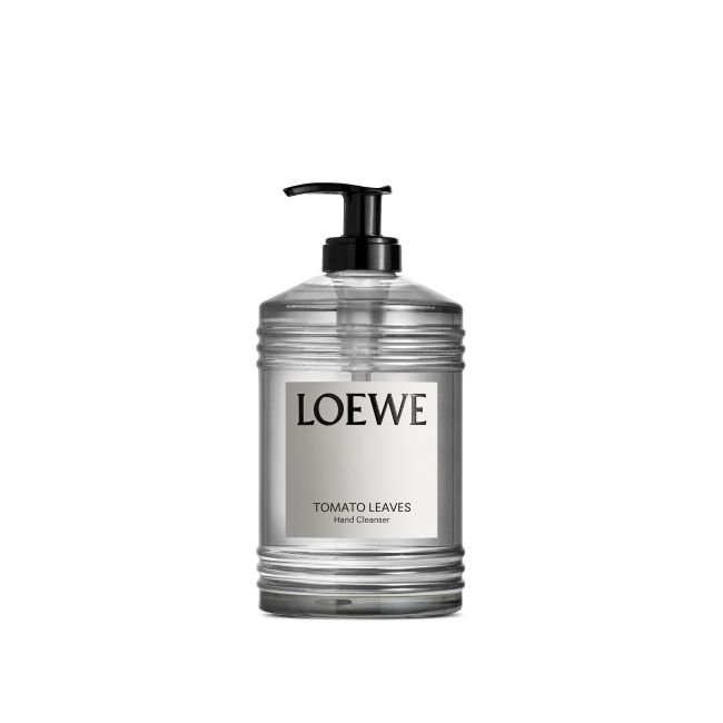 LOEWE Tomato Leaves hand cleanser in transparante glazen fles met zwarte pomp